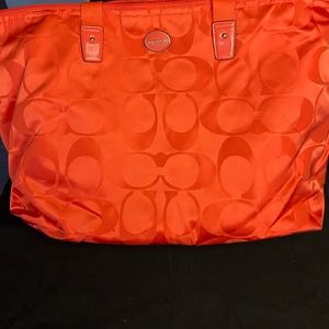 Coach authentic two piece weekend travel/tote bag. In really good condition.